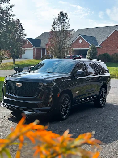 Black Cadillac Escalade with corrected, gloss-finished paint after detailing by Constable Car Detailing